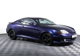 Подержанный автомобиль Hyundai Coupe 2002 года (3 фото)