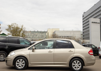 Подержанный автомобиль Nissan Tiida Sedan 2011 года (6 фото)