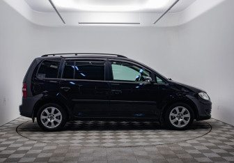 Подержанный автомобиль Volkswagen Touran 2008 года (4 фото)