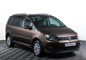 Подержанный автомобиль Volkswagen Touran 2013 года (3 фото)