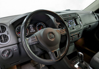 Подержанный автомобиль Volkswagen Tiguan 2014 года (13 фото)
