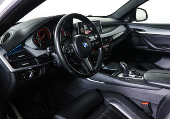 Подержанный автомобиль BMW X6 2016 года (15 фото)