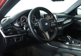 Подержанный автомобиль BMW X6 2014 года (13 фото)
