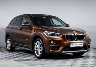 Подержанный автомобиль BMW X1 2015 года (3 фото)