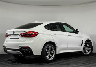Подержанный автомобиль BMW X6 2018 года (2 фото)