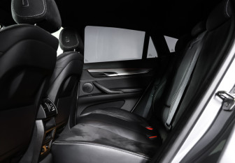 Подержанный автомобиль BMW X6 2018 года (12 фото)