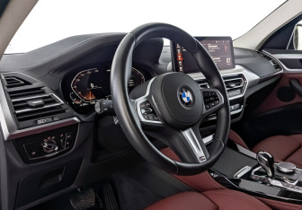 Подержанный автомобиль BMW X4 2024 года (14 фото)
