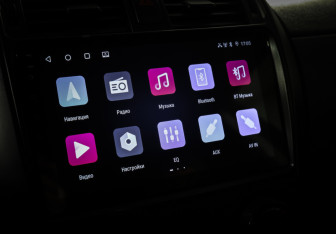 Подержанный автомобиль Toyota Corolla Sedan 2012 года (19 фото)