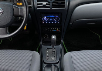 Подержанный автомобиль Nissan Almera Classic 2006 года (14 фото)