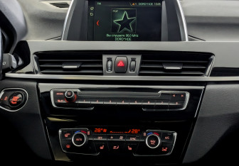 Подержанный автомобиль BMW X1 2017 года (15 фото)