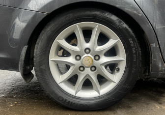 Подержанный автомобиль Kia Ceed Wagon 2008 года (13 фото)