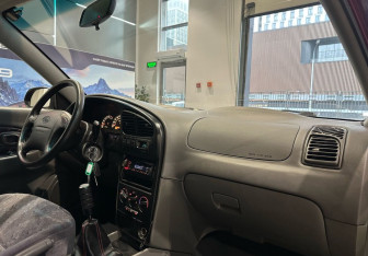 Подержанный автомобиль Kia Spectra Sedan 2007 года (10 фото)