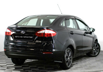 Подержанный автомобиль Ford Fiesta Sedan 2016 года (5 фото)