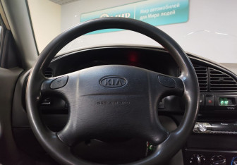 Подержанный автомобиль Kia Spectra Sedan 2007 года (15 фото)
