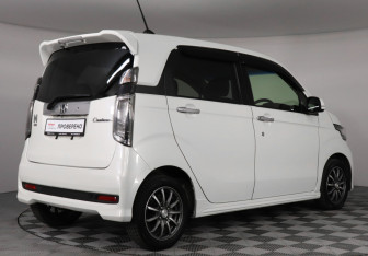 Подержанный автомобиль Honda N-WGN 2015 года (5 фото)