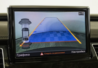Подержанный автомобиль Audi A8 2014 года (15 фото)