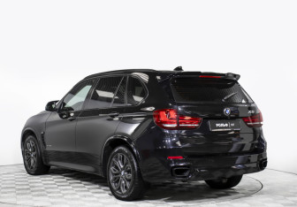 Подержанный автомобиль BMW X5 2015 года (7 фото)