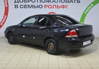 Подержанный автомобиль Nissan Almera Classic 2012 года (6 фото)