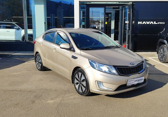 Подержанный автомобиль Kia Rio Sedan 2014 года (3 фото)