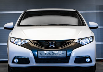 Подержанный автомобиль Honda Civic Hatchback 2013 года (2 фото)