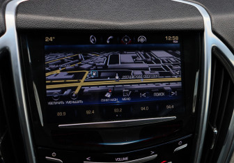 Подержанный автомобиль Cadillac SRX 2014 года (18 фото)