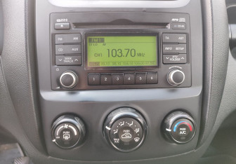 Подержанный автомобиль Kia Sportage 2010 года (14 фото)