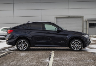 Подержанный автомобиль BMW X6 2018 года (4 фото)