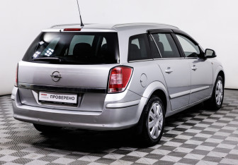 Подержанный автомобиль Opel Astra Wagon 2014 года (5 фото)