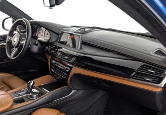 Подержанный автомобиль BMW X6 M 2016 года (11 фото)