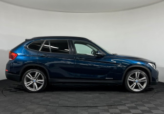 Подержанный автомобиль BMW X1 2014 года (6 фото)