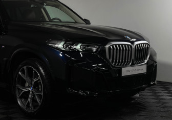 Подержанный автомобиль BMW X5 2025 года (25 фото)