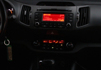 Подержанный автомобиль Kia Sportage 2011 года (13 фото)