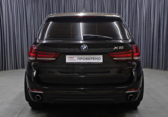 Подержанный автомобиль BMW X5 2014 года (6 фото)