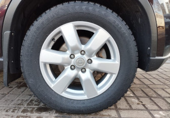 Подержанный автомобиль Nissan X-Trail 2013 года (17 фото)