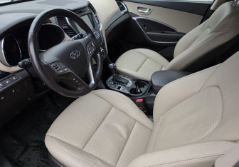 Подержанный автомобиль Hyundai Santa Fe 2014 года (9 фото)