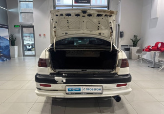 Подержанный автомобиль Toyota Corona Sedan 1998 года (6 фото)