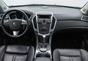 Подержанный автомобиль Cadillac SRX 2012 года (13 фото)