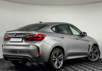 Подержанный автомобиль BMW X6 M 2015 года (2 фото)