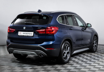 Подержанный автомобиль BMW X1 2015 года (5 фото)