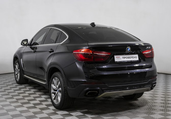 Подержанный автомобиль BMW X6 2017 года (7 фото)