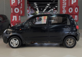 Подержанный автомобиль Daewoo Matiz 2009 года (8 фото)