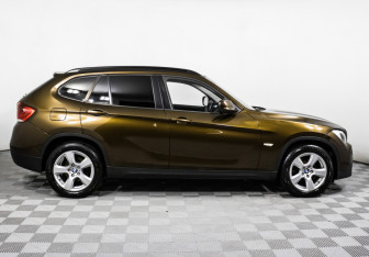 Подержанный автомобиль BMW X1 2011 года (4 фото)