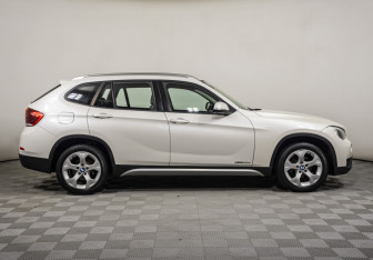 Подержанный автомобиль BMW X1 2014 года (4 фото)