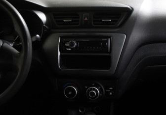 Подержанный автомобиль Kia Rio Hatchback 2013 года (9 фото)