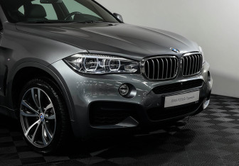 Подержанный автомобиль BMW X6 2017 года (22 фото)