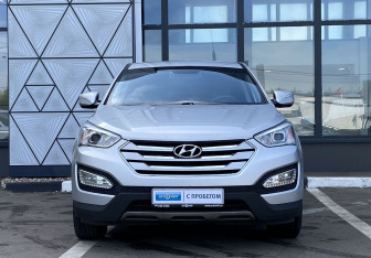 Подержанный автомобиль Hyundai Santa Fe 2014 года (2 фото)