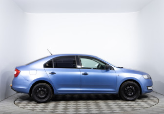 Подержанный автомобиль Skoda Rapid Liftback 2014 года (4 фото)