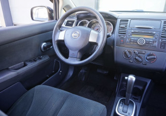 Подержанный автомобиль Nissan Tiida Sedan 2011 года (13 фото)