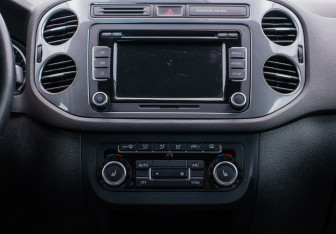 Подержанный автомобиль Volkswagen Tiguan 2014 года (14 фото)