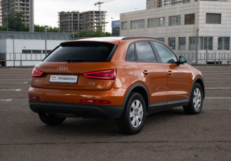 Подержанный автомобиль Audi Q3 2013 года (5 фото)